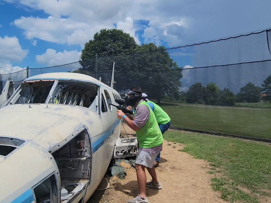 Players at Central Alabama Paintball using the car bunker on one of the five fields