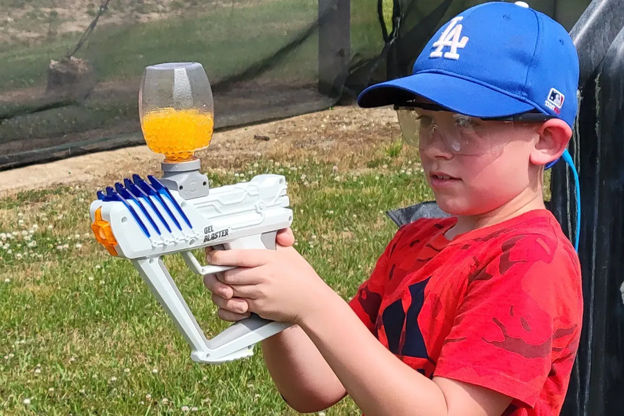 A young player with a Gellyball blaster at Alabama Paintball 280